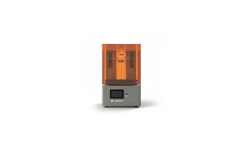 Kompakter 3D-Drucker mit orangefarbenem Schutzgehäuse und digitalem Display.